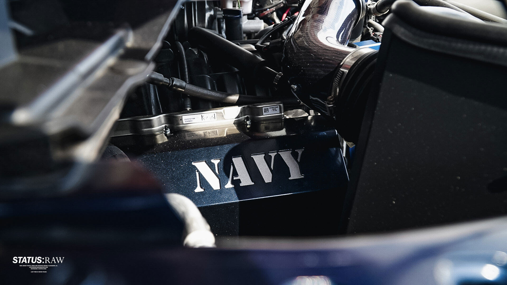 custom truck engine detail that says NAVY
