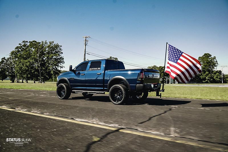Veteran RAM truck with American flag on the back