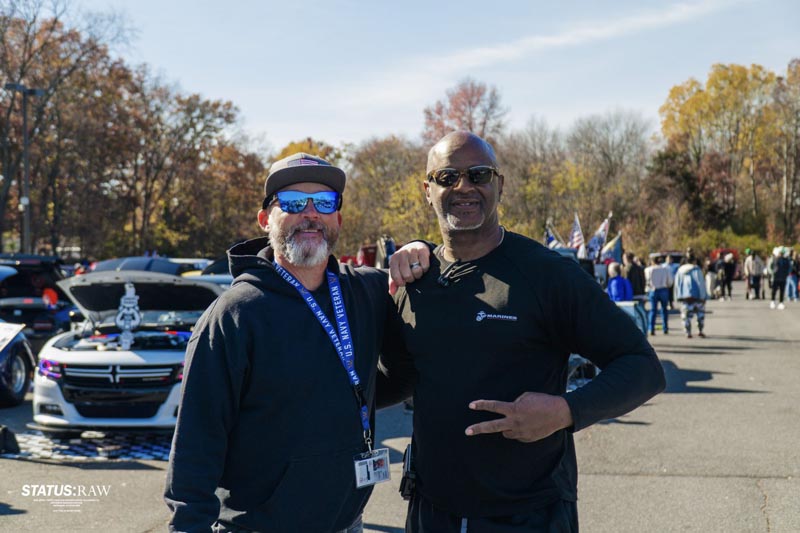 Andre and supporter posing for a photo at an event