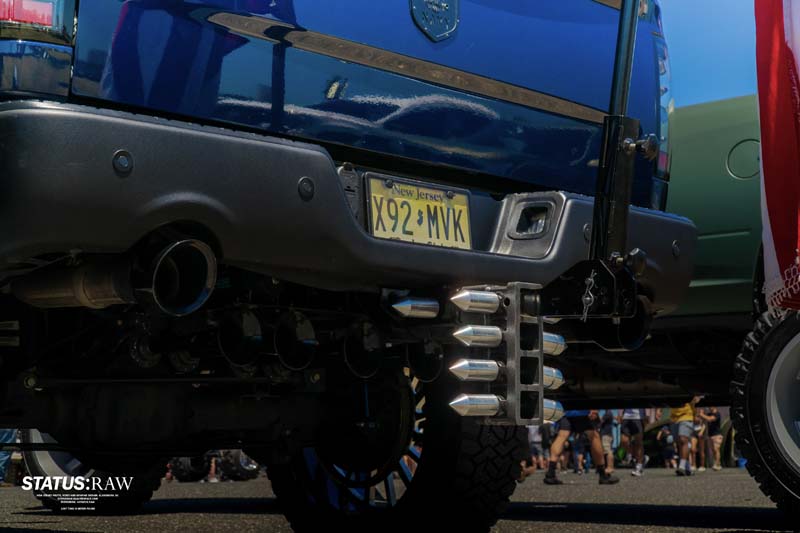 Pick-up truck with flag attachment.