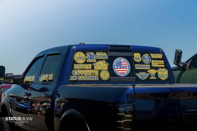 Pick-Up Truck with lots of sticker on the back wind-shield