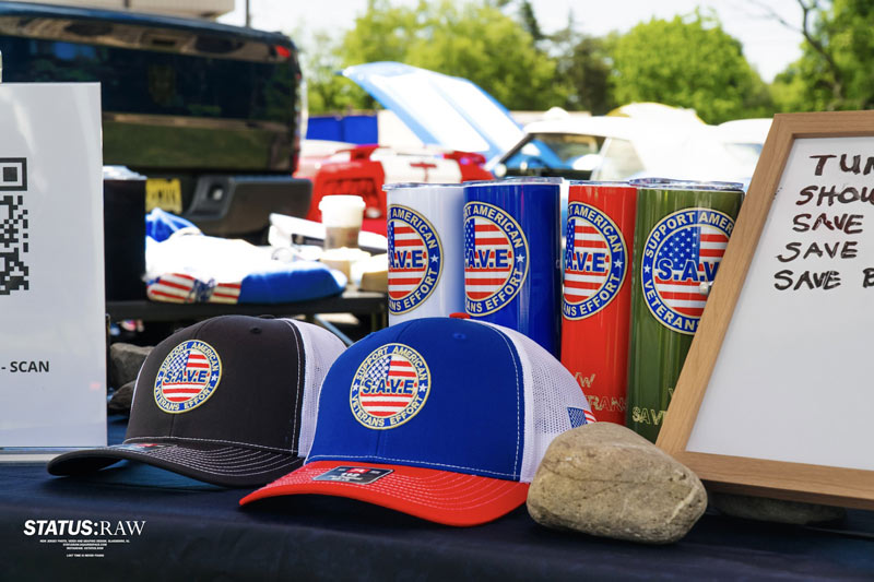 Table with hats and cups at outdoor market